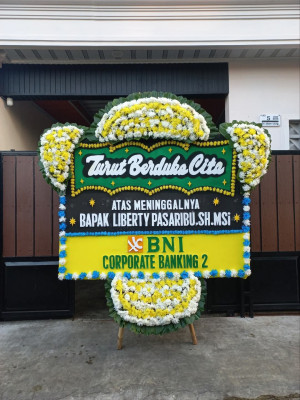 Papan Bunga Duka di Muara