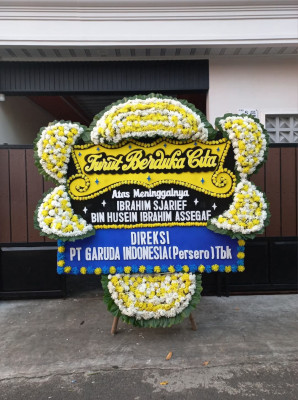 Papan Bunga Duka di Muara