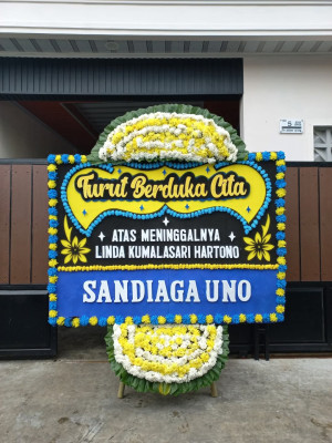 Papan Bunga Duka di Muara
