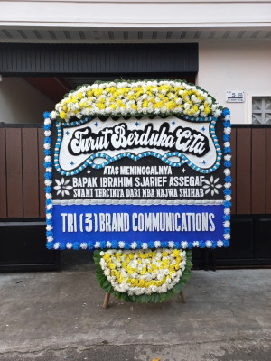 Papan Bunga Duka di Muara